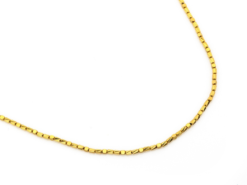 Naszyjnik złoty z diamentowanych elementów