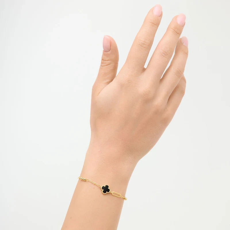 Bransoletka pozłacana koniczyna z onyksem