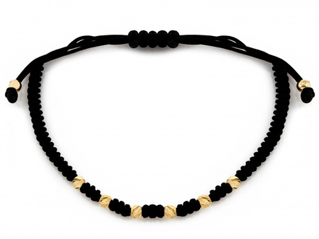 Złota bransoletka z diamentowanymi kulkami na czarnym sznurku