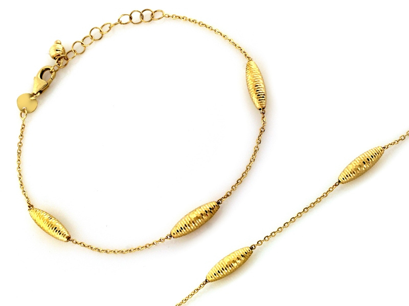 Złota bransoletka z owalnymi elementami