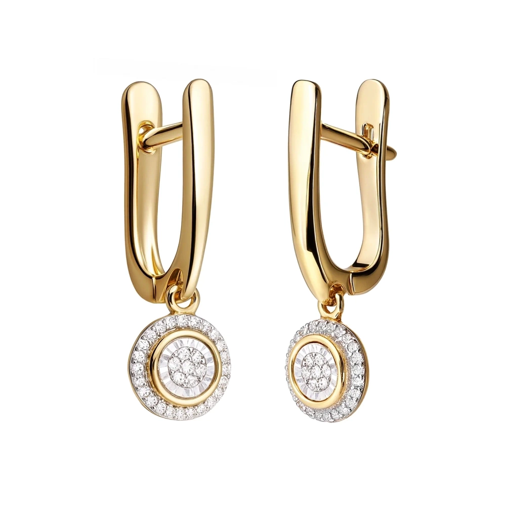 Złote kolczyki wiszące z diamentami