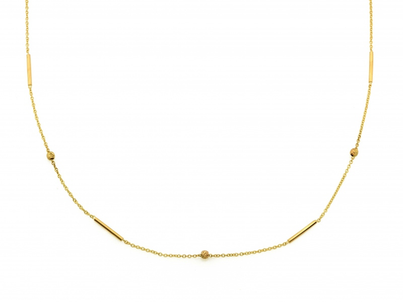 Złoty naszyjnik z delikatnymi elementami