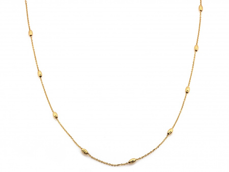 Złoty naszyjnik z diamentowanymi kulkami