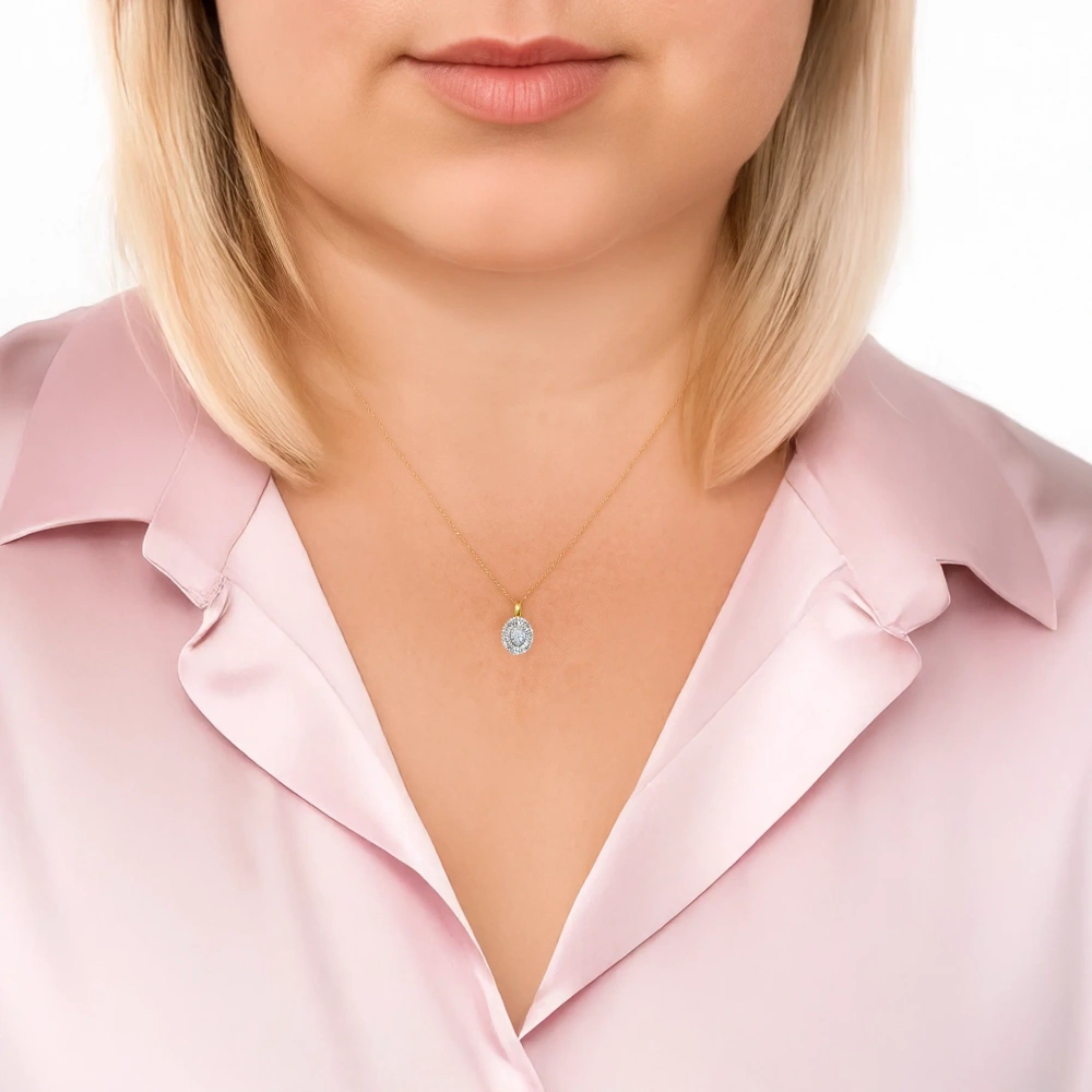 Złoty naszjnik z owalną zawieszką z diamentami