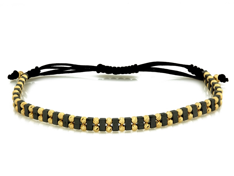 Złota bransoletka z hematytem na czarnym sznurku