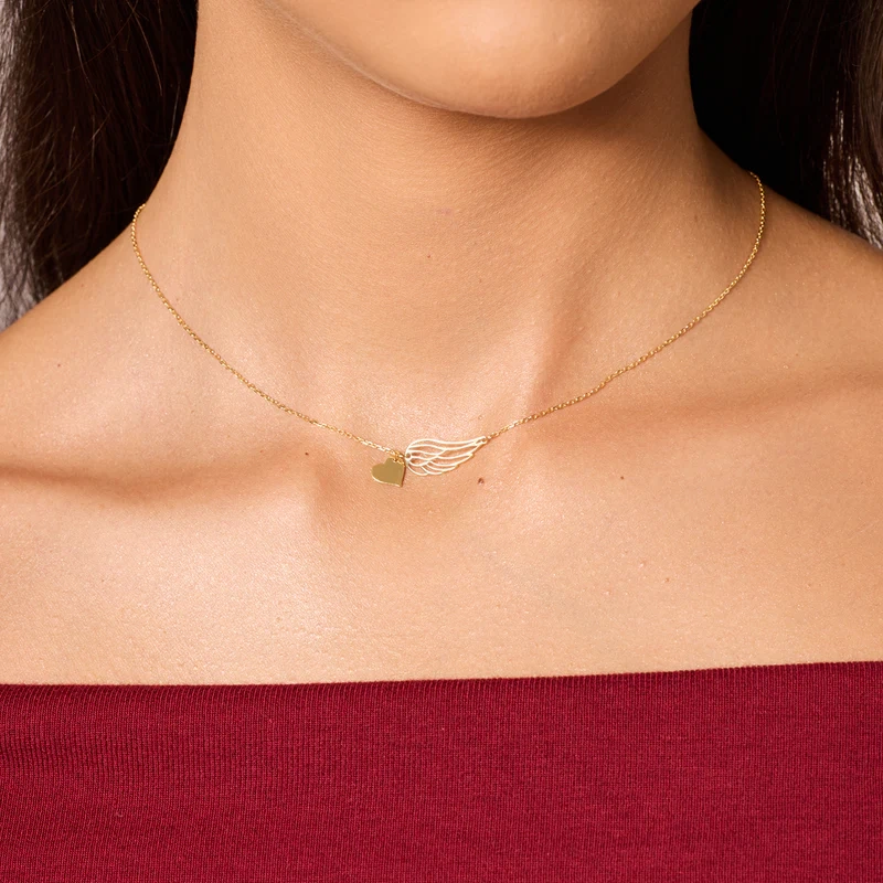 Pozłacany naszyjnik skrzydło z sercem